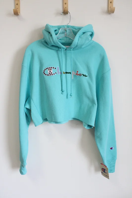 NEW Champion Blue Reverse Weave Embroidered Logo Crop Hoodie | M Hoodie with Rhinestones Sparkly Elegant NEW Champion Blue Reverse Weave Embroidered Logo Crop Hoodie | M Hoodie with Rhinestones Sparkly Elegant